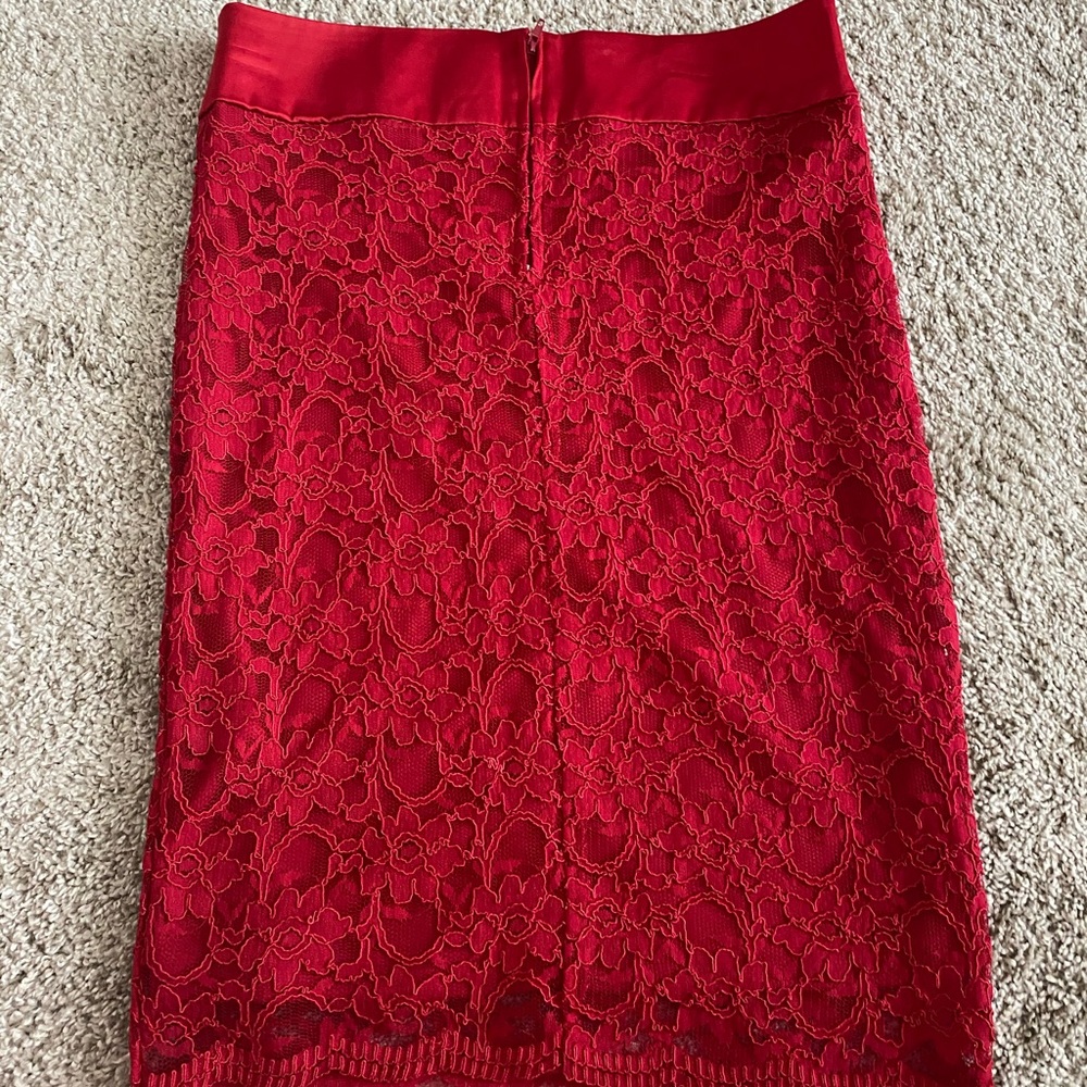 I’m selling you this cute lace skirt!